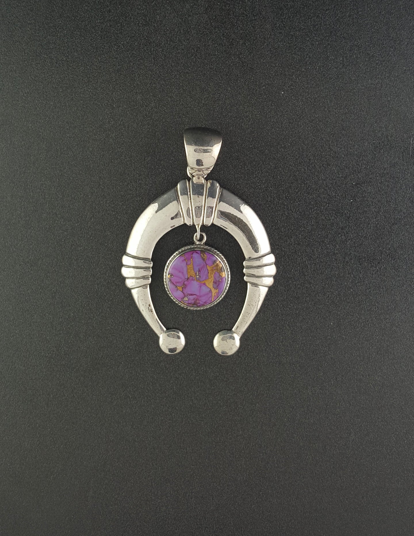 Medium Navajo Naja Purple turquoise sterling silver pendant
