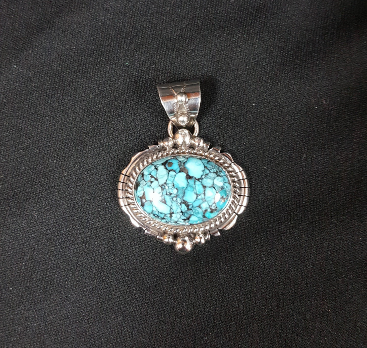 Sleeping Beauty Turquoise blackweb  sterling silver Oval Pendant