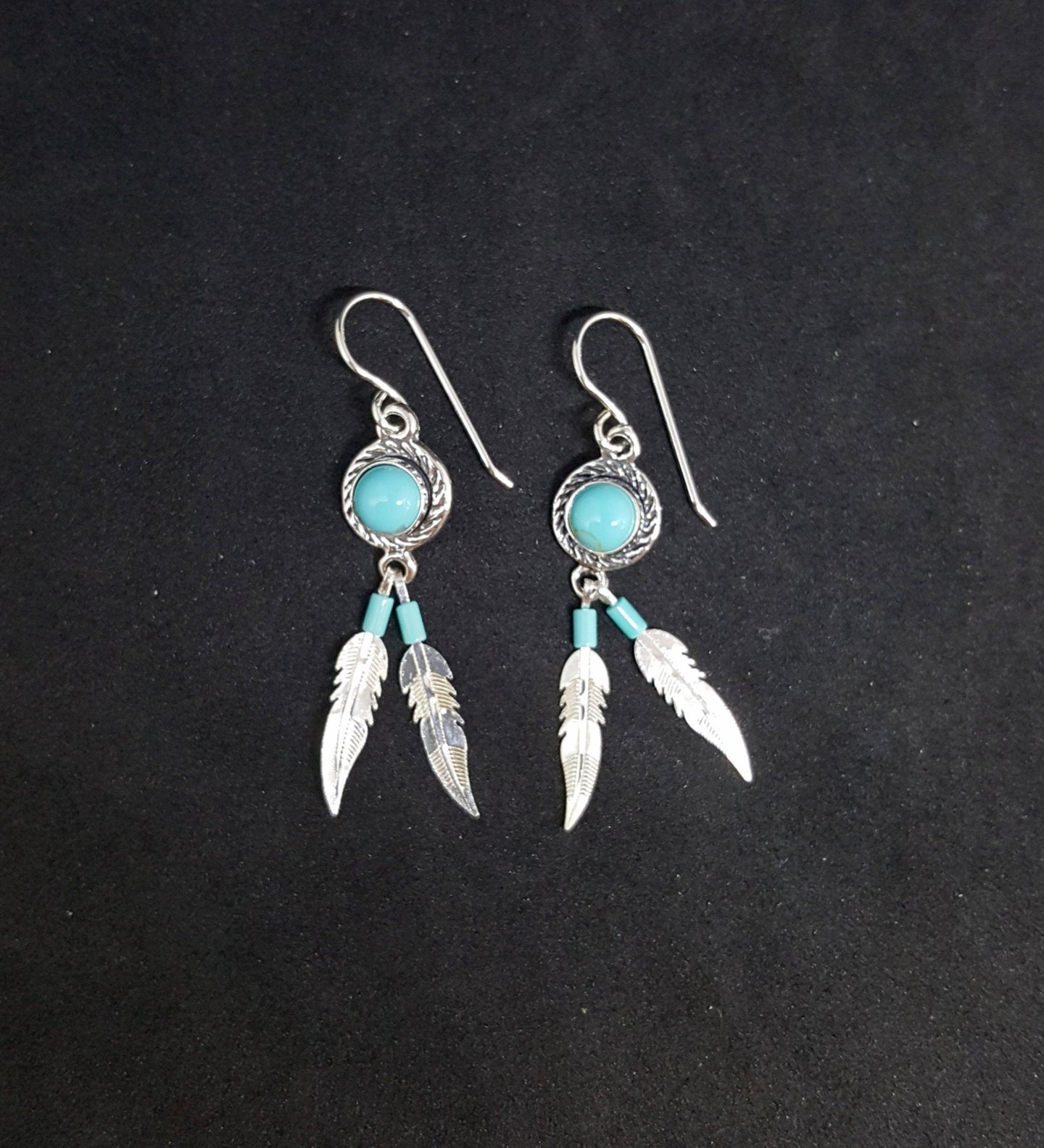 Southwest Two Feathers Round 6mm Kingman Turquoise sterling silver dangle earrings