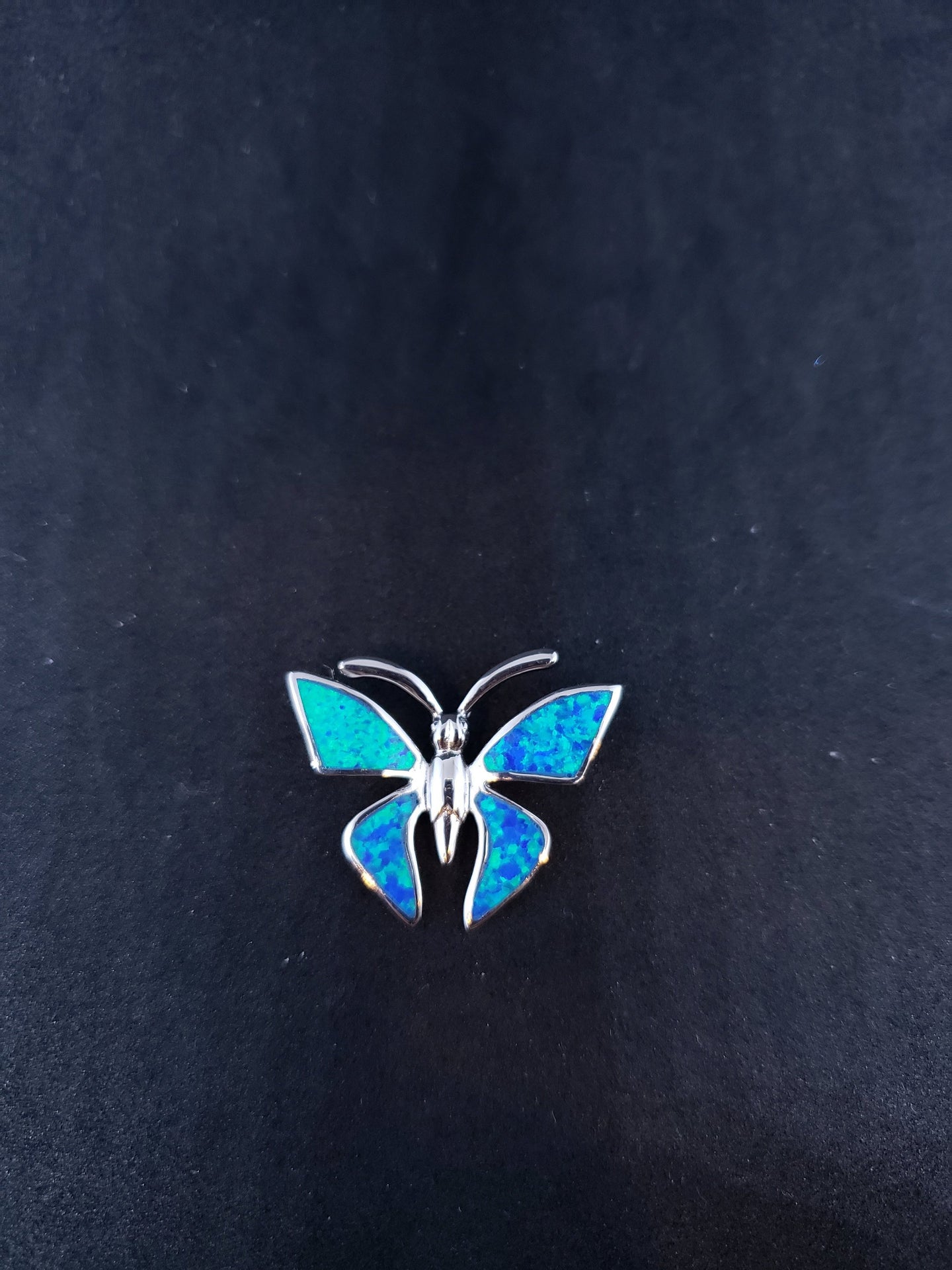 Butterfly blue opal sterling silver pendant