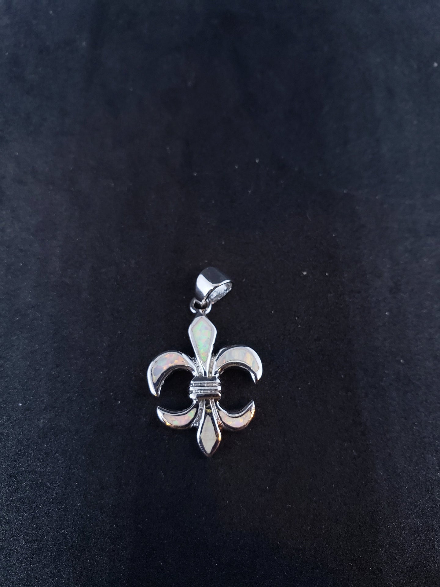 Fleur-de-lis design inlay white fire opal sterling silver pendant