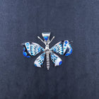 Southwest butterfly inlay blue fire opal white fire opal sterling silver pendant