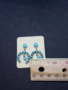 Southwest Naja sleeping beauty turquoise sterling silver dangle earrings