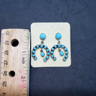 Southwest Naja sleeping beauty turquoise sterling silver dangle earrings