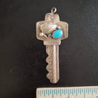Vintage Navajo key shape with shell design and sleeping beauty turquoise sterling silver pendant