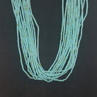 26 inches 15 strands Santo Domingo Turquoise on a rope beaded necklace