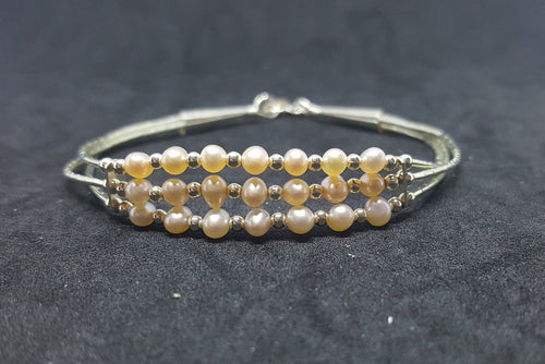7 inches Mother of Pearl sterling silver beaded bracelet