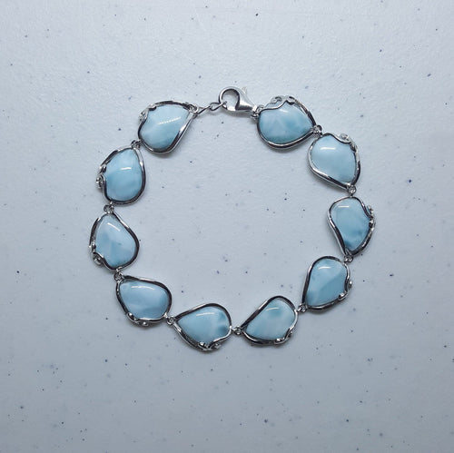 Blue Larimar Wavy pattern teardrop shape sterling silver chain bracelet