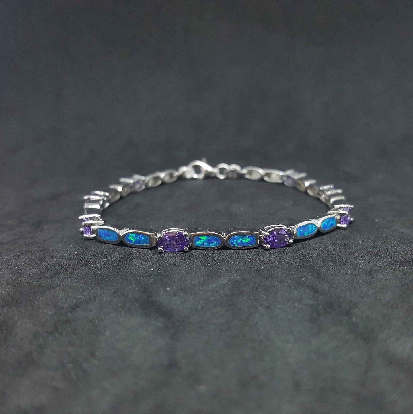 Oval Amethyst with Oval Blue Fire Opal sterling silver link bracelet