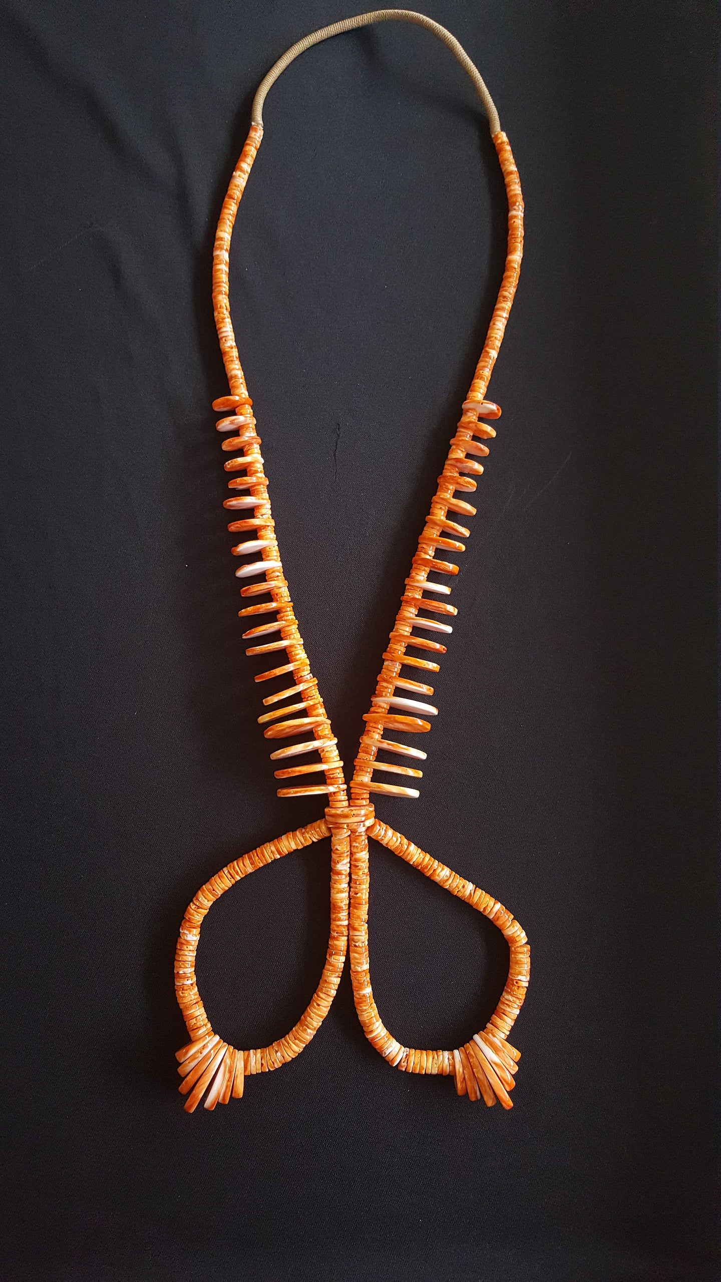 28 inches Jacla Spiny Oyster chips on a rope beaded necklace