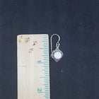 Wavy flower design 6 mm round White Fire Opal sterling silver dangle earrings