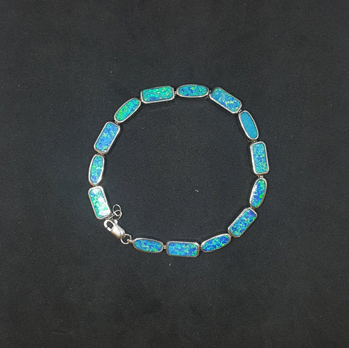 Blue Fire Opal oval and rectangle shape sterling silver chain bracelet