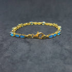 Oval Topaz with Oval Blue Fire Opal sterling silver link bracelet
