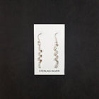 Hanging Swirl long thin White Opal Sterling silver dangle earrings